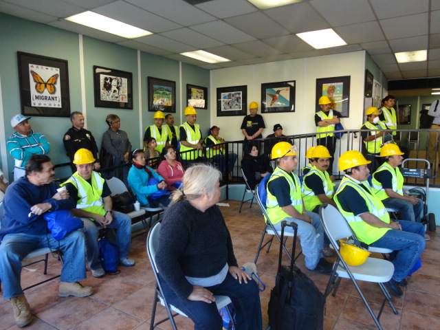 Pasadena Community Job Center Workers listening to speakers